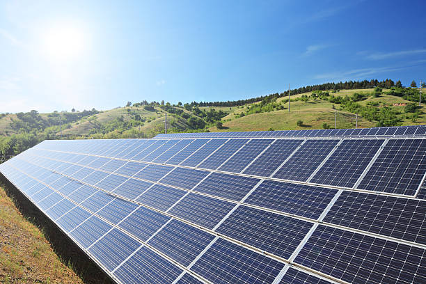 istock Solar photovoltaic cell panels under sunny sky 466918333