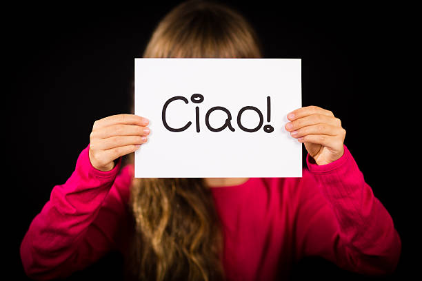 istock Child holding sign with Italian word Ciao - Hello 466920508