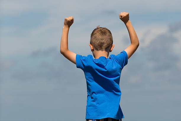 istock Boy with clenched fists 466921312