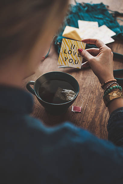 istock Woman with love message and tea 466924031