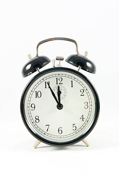 istock Old Alarm Clock isolated on white background 466924495
