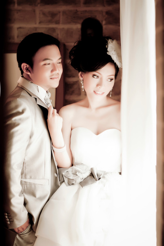 Asian wedding couple show concept of love