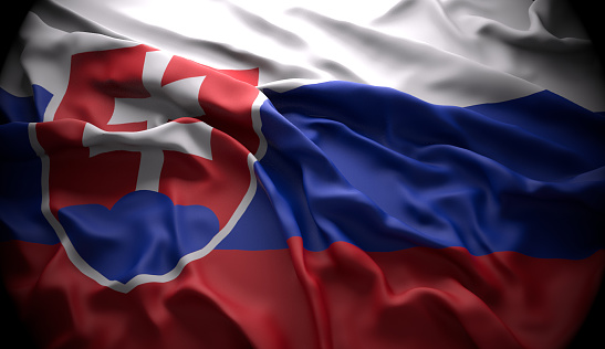 Slovakia, Bratislava official national state flag in black ambience with light coming from the top