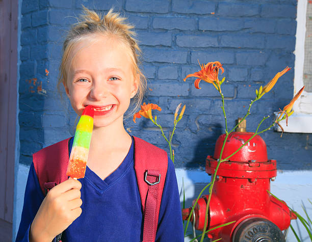 istock Little Girl eat Popsicle 466932267