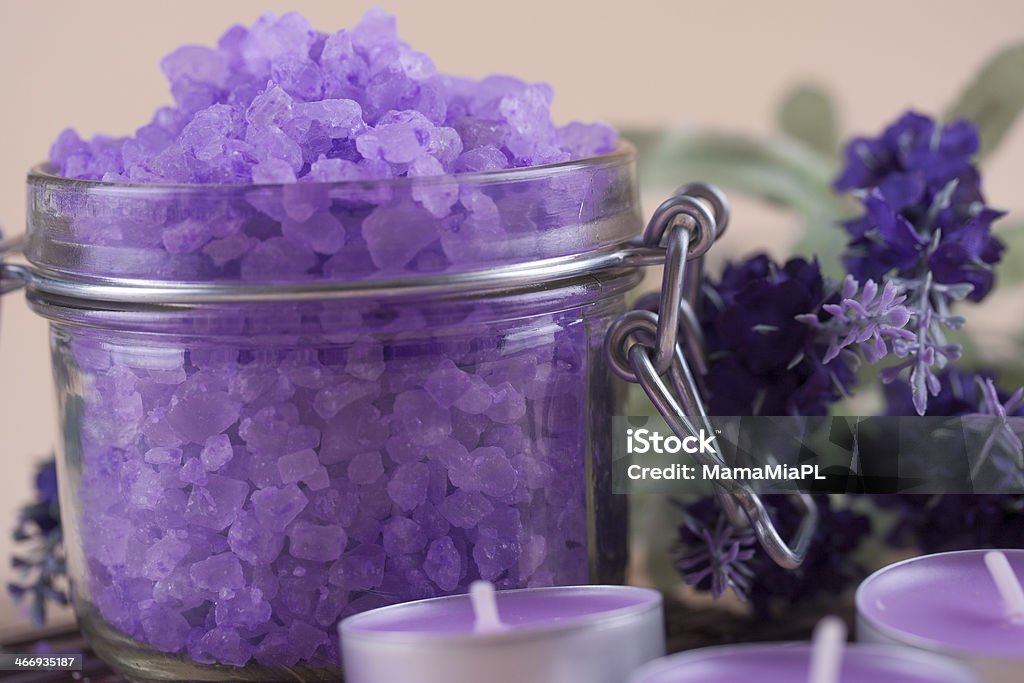 Bath salt Aromatherapy and relaxation - colorful lavender bath salt in a glass Aromatherapy Stock Photo