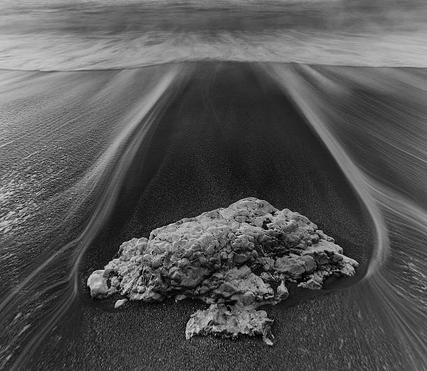 istock Beautiful long exposure beach landscape with rock 466936309