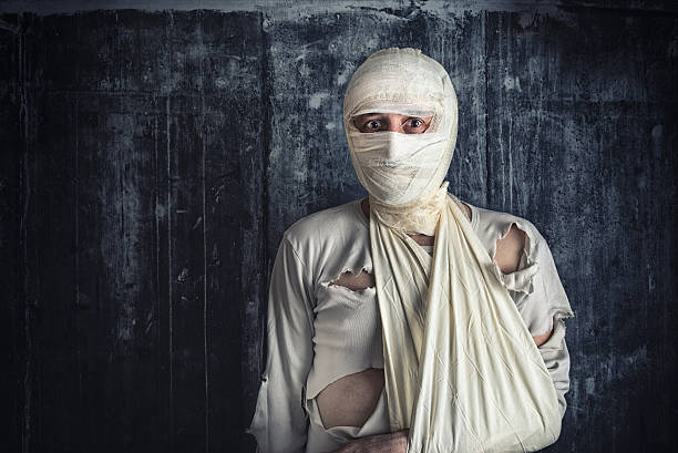 istock Injured Man with Head Bandages 466937422