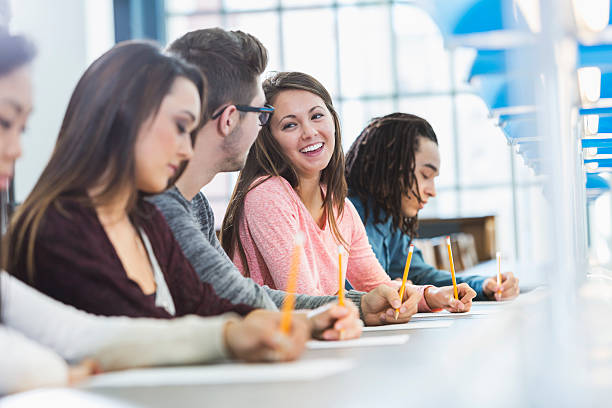 istock Group of teenagers taking a test 466938758