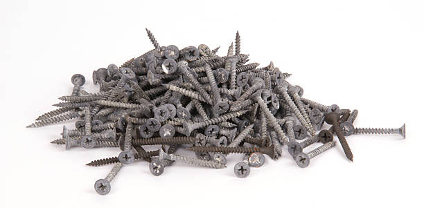 istock Pile of old screws closeup on white background 466938769