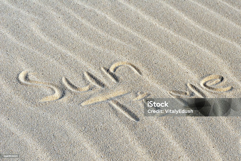 Inschrift "Sonne auf einem sand der Zeit" - Lizenzfrei Alphabet Stock-Foto