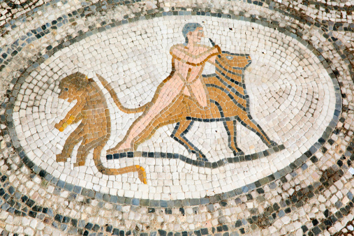 Volubilis is an ancient roman town in Morocco. Here's a mosaic on the floor of a house representing the 7th labour of Hercules: to capture the Cretan bull.