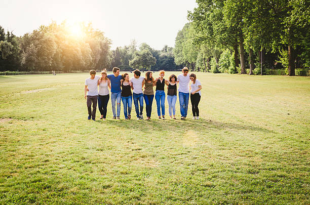 istock Group Of Friends Walking Together 466944862