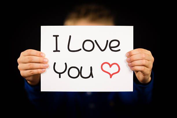 istock Child holding I Love You sign 466945542