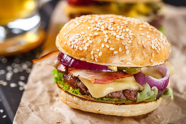 istock Delicious burger on wooden board 466945994