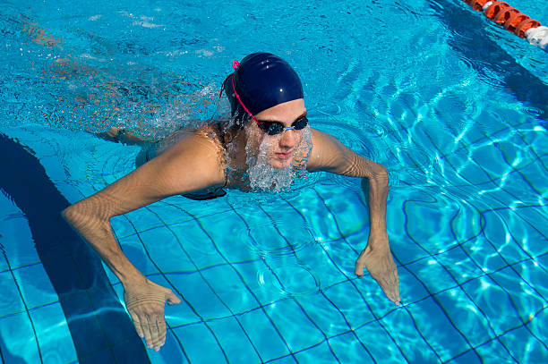 istock Female swimmer at breast stroke 466947069