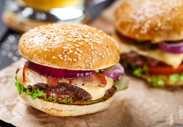 istock Delicious burger on wooden board 466949720
