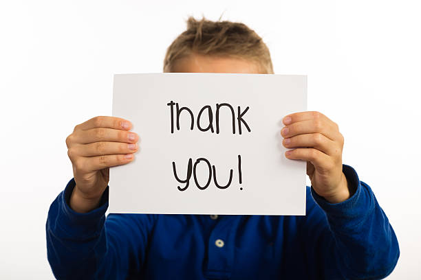 istock Child holding Thank You sign 466949814