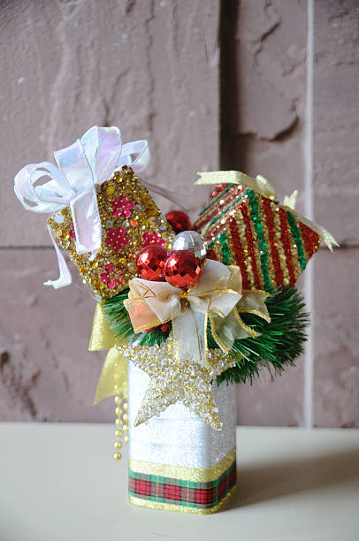 Christmas accessories in box on table