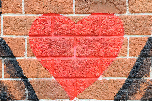 istock Red heart on red brick wall, love concept 466951090