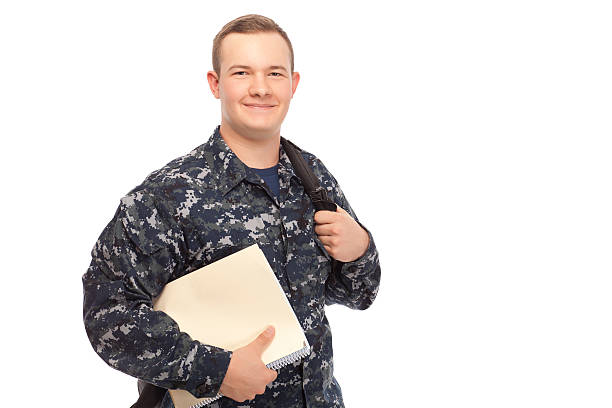 Young man in navy uniform with shoulder bag and file
