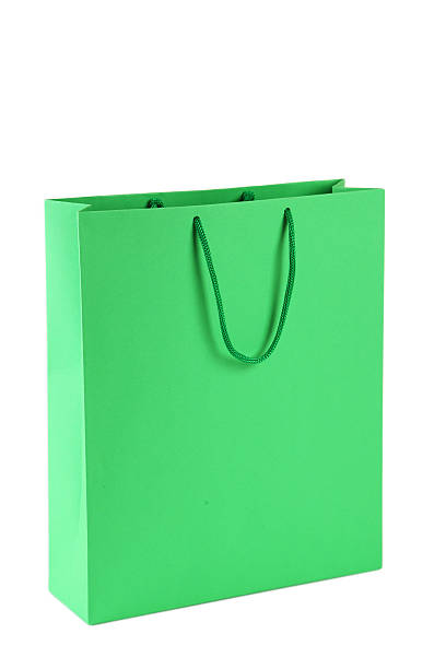 istock Green shopping bag isolated on white 466952860