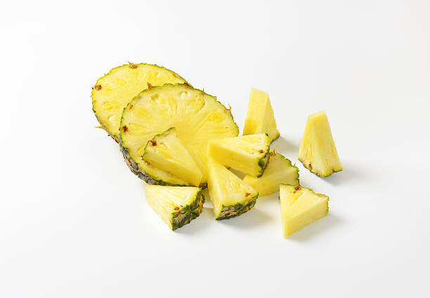 istock Fresh pineapple slices and wedges 466953348