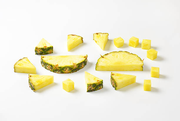 istock Fresh pineapple slices and wedges 466953396