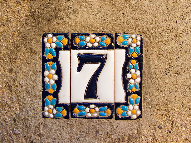 istock Number seven in a ceramic tile on street 466954433