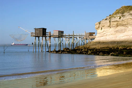 Carrelets at Saint Georges of Didonne at low tide in France, region Charente-Poitou