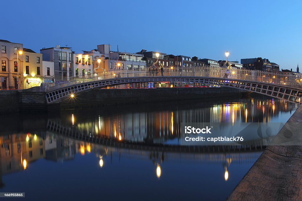 Dublin night scene Dublin night scene with Ha'penny bridge and Liffey river lights . Ireland Bridge - Built Structure Stock Photo