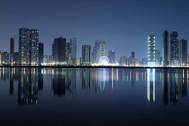 Sharjah City skyline at night Sharjah City skyline at night. Sharjah, United Arab Emirates sharjah city stock pictures, royalty-free photos & images