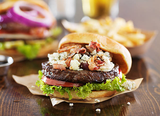 gourmet burgers on wooden table
