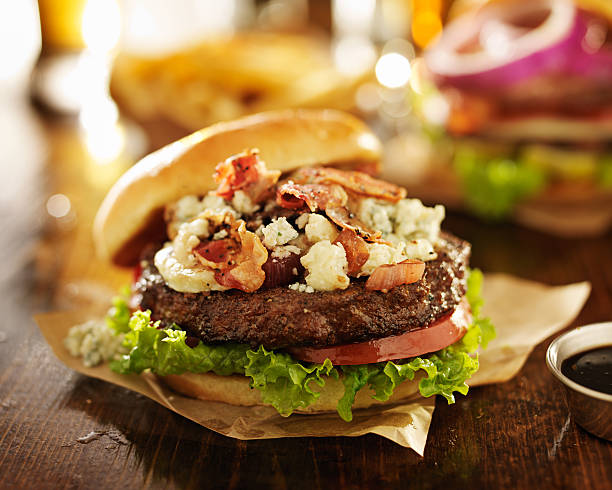 istock table with gourmet burgers 466958674