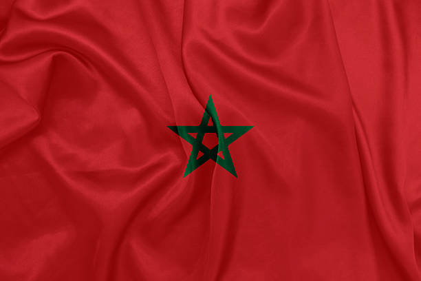 istock Morocco - Waving national flag on silk texture 466959220