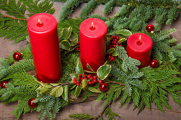 istock Red candles in Christmas evergreen arrangement 466959870