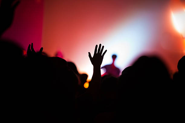 istock christian music concert with raised hand 466959962
