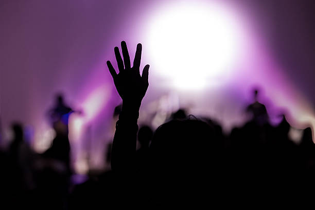 istock christian music concert with raised hand 466959974