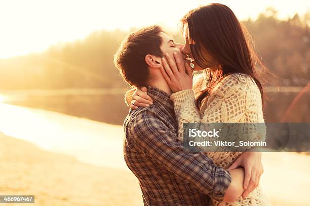Young Couple In Love Outdoor Stock Photo - Download Image Now - Kissing, Adolescence, Boyfriend