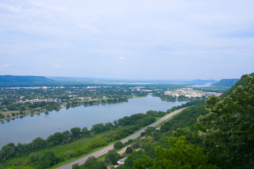 Aerial view of city of Winona from atop bluffs above highway 61 and Lake Winona in Minnesota
