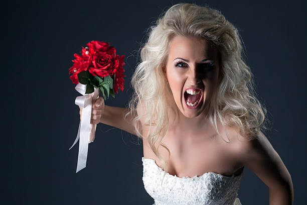 istock Emotional bride screaming looking at camera 466969161