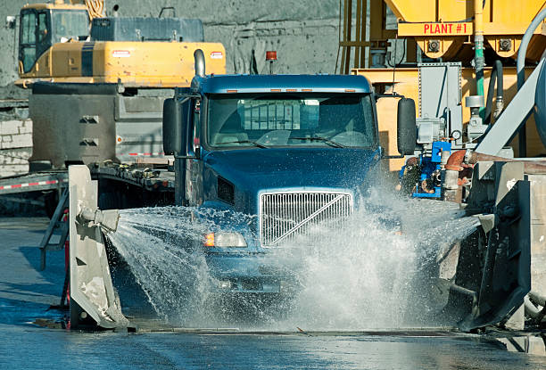 at a large construction site removing a hill during an airport runway expansion project