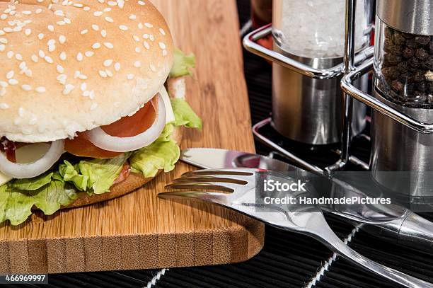 Burger On A Cutting Board Stock Photo - Download Image Now - American Culture, Barbecue - Meal, Beef