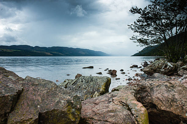 View of Loch ness Lake in Scotland, cloudy day and dramatic light