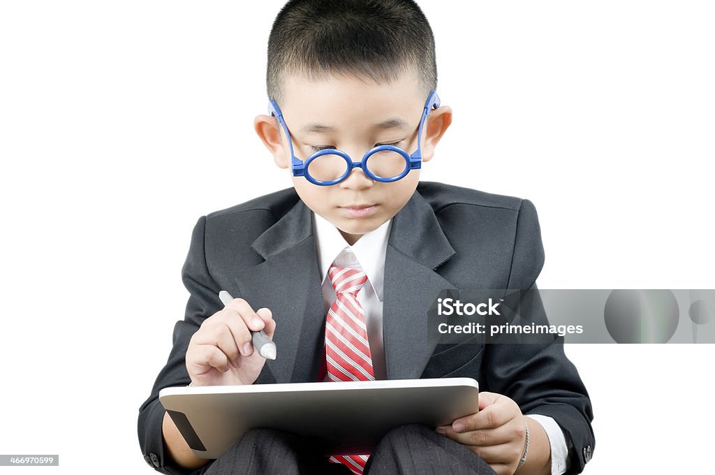 Business boy  with electronic tablet Adolescence Stock Photo