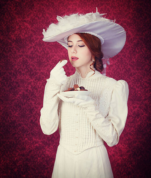 istock Beautiful redhead women with candy. 466971821