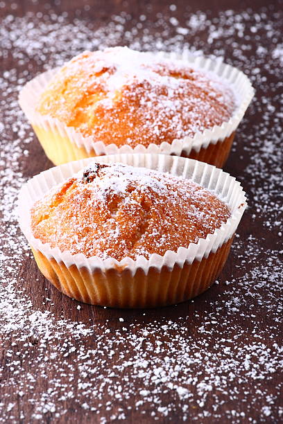 istock Delicious muffins on a wooden table 466971930