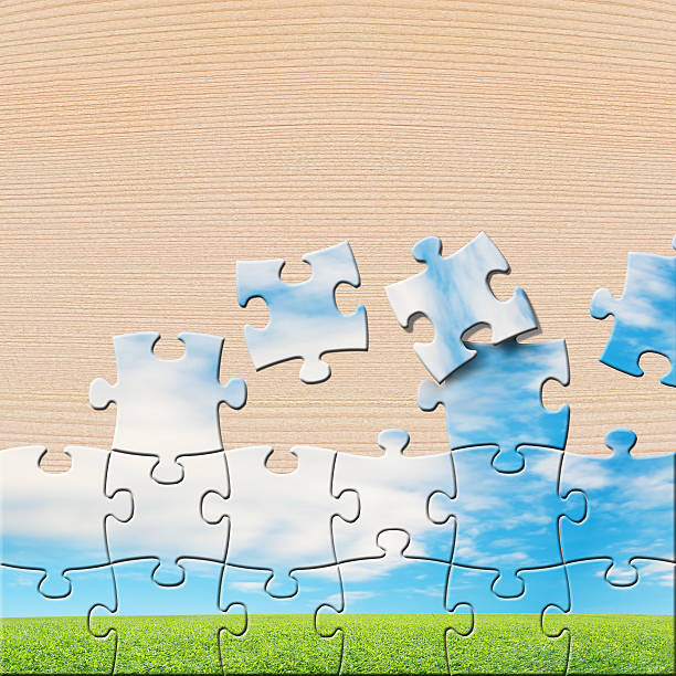 istock Puzzles with beautiful landscape on wooden table 466972233