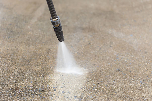 istock Outdoor floor cleaning with high pressure water jet 466972400