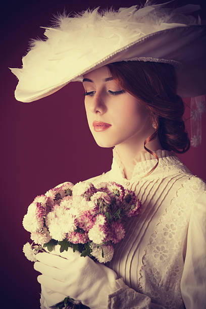 istock Beautiful redhead women with bouquet 466972899