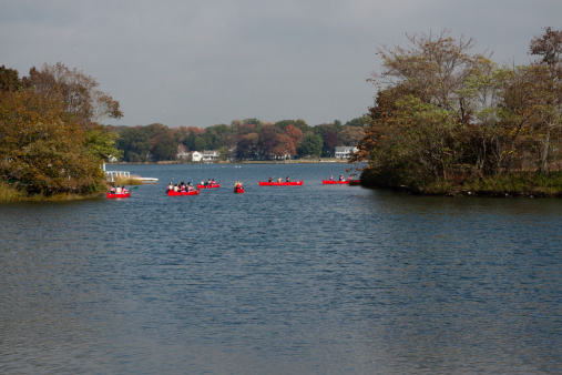 Stamford, CT, USA - October 17, 2013: Scene of school children in canoes on a beautiful October day at the city \